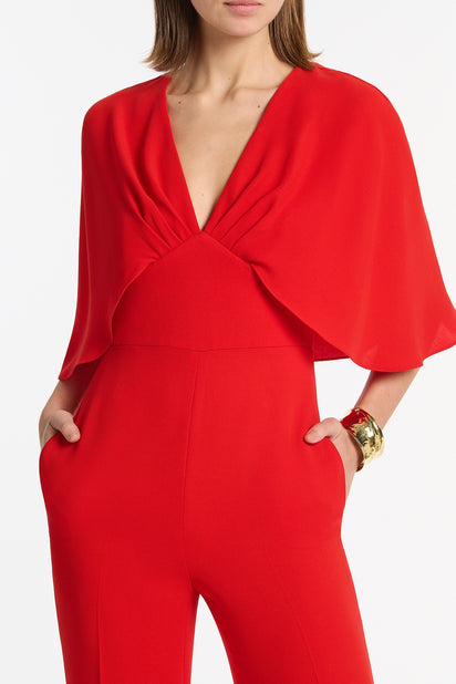 RED CREPE TUCK FRONT CAPE JUMPSUIT