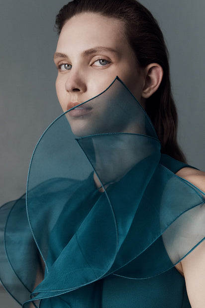 SERPENTINE CREPE RUFFLE FRONT GOWN