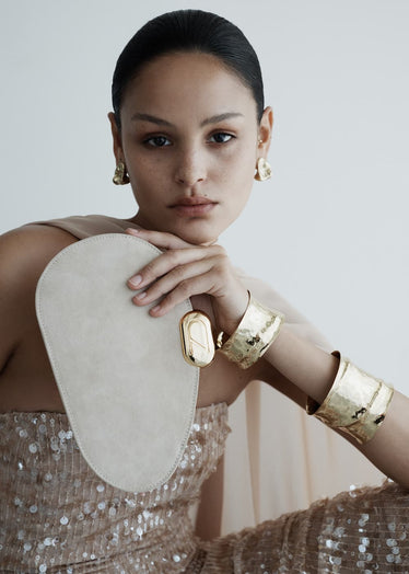 IVORY CZ OVAL SUEDE CLUTCH